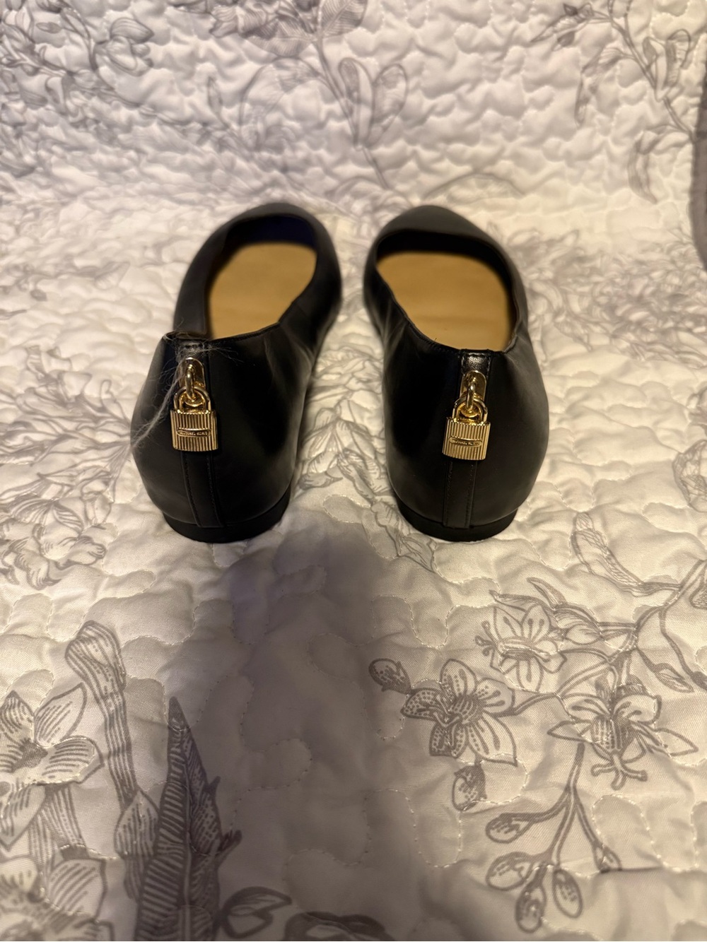 Michael Kors Women's Black Leather Ballet Flats with Gold Padlock Accent